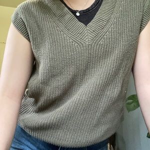 Green sweater vest